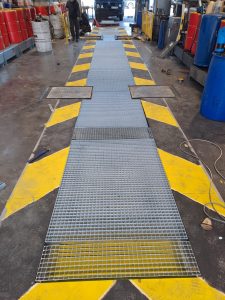 Fosse protegée avec caillebotis chez renault trucks créée protection sur mesure par xpertive