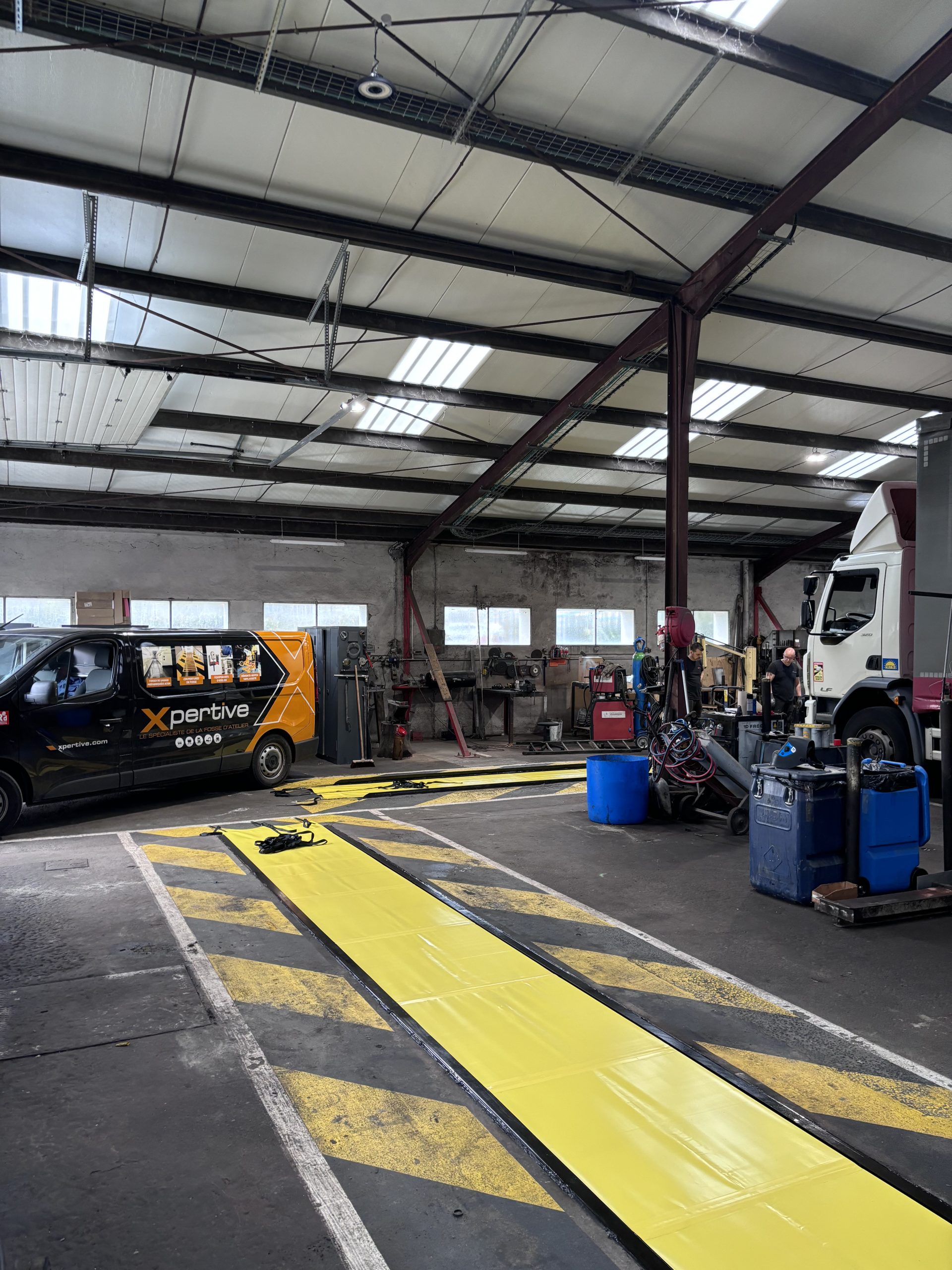 mise en conformite de cet atelier avec couverture de fosse en pvc aux normes CARSAT et INRS